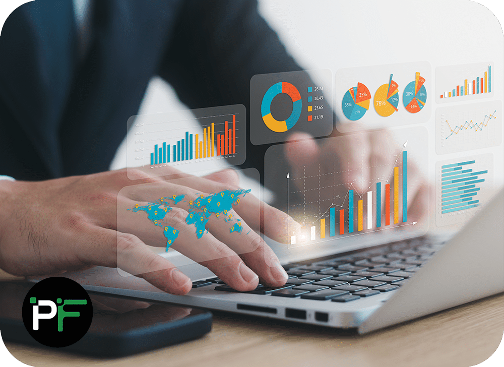 Dashboard icons, graphs and tables popping up from a laptop to demonstrate intelligence reporting systems