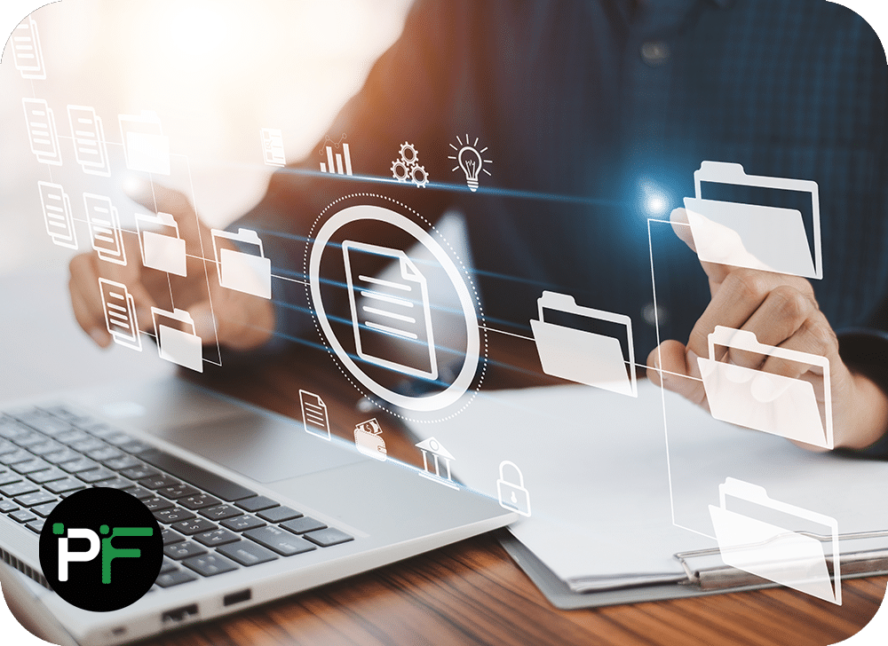 Data Warehousing solutions interface image showing folder and documents icons overlaying a picture of a man at a laptop