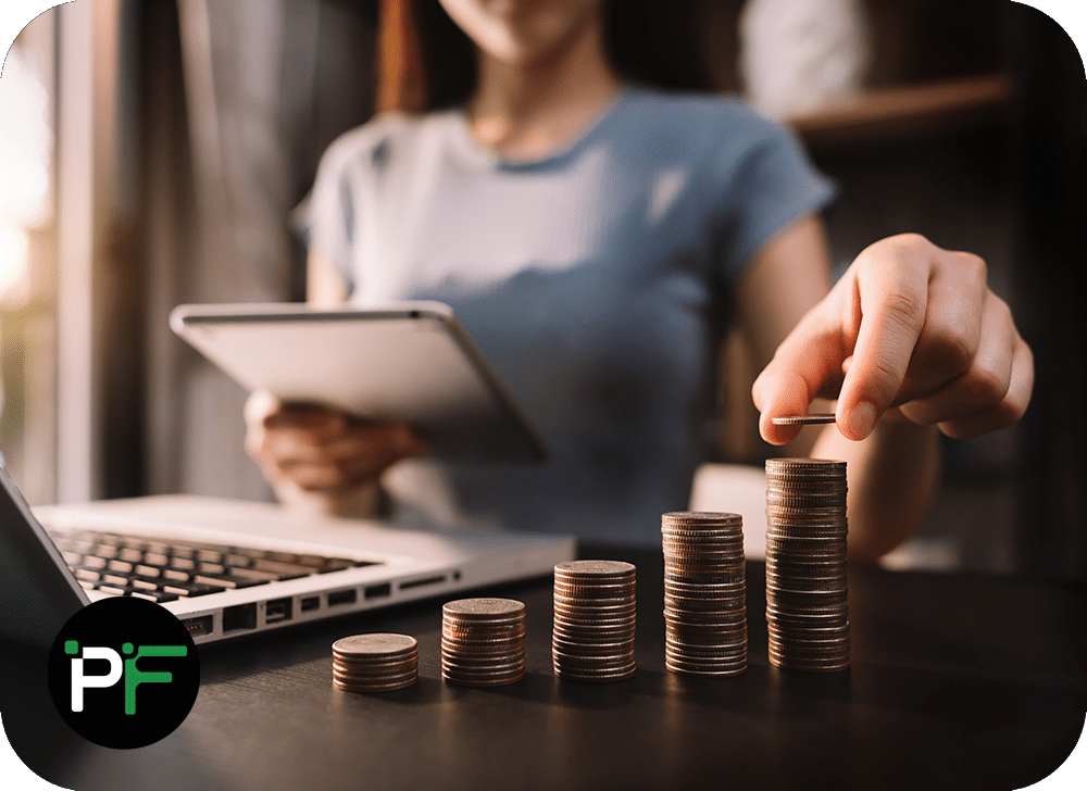 Woman stacking coins to represent Pixel Fusion's flexible pricing solutions - 1000x728px