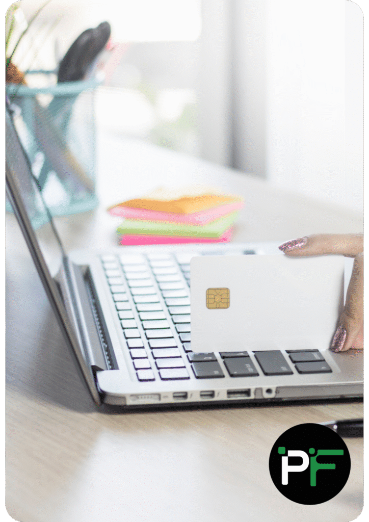 Laptop shown open next to credit card, overlaid with the Pixel Fusion logo